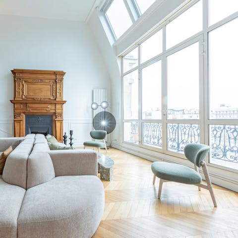 Take in the views over this Parisian neighbourhood from the large windows