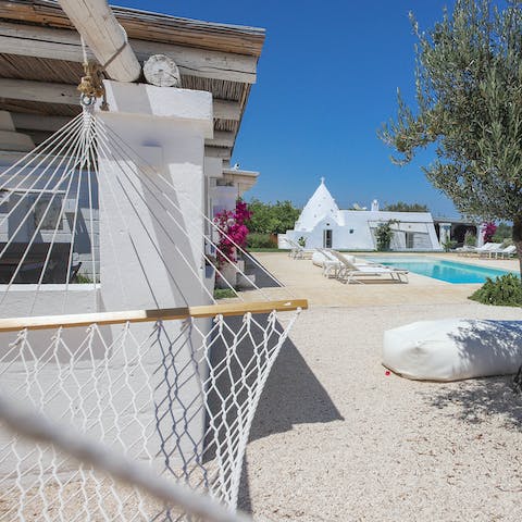 Swing on the hammock while taking in the the blissful Mediterranean beauty that surrounds you