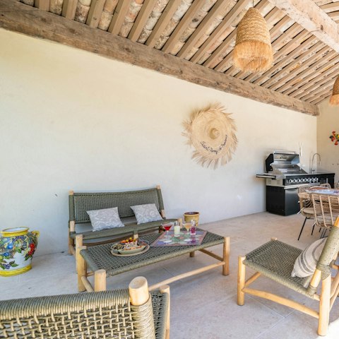 Sip a glass of something chilled in the shade of the terrace