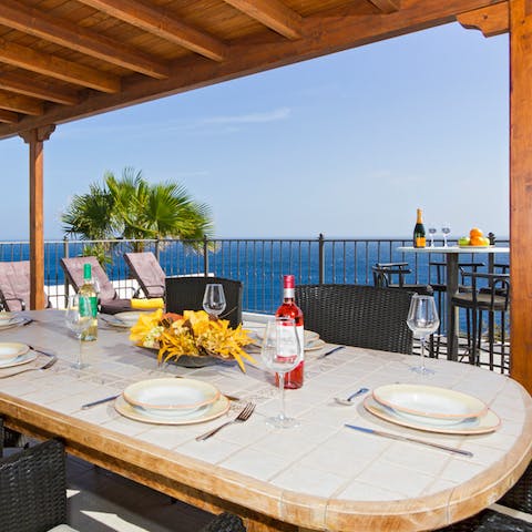 BBQ the pescado a la plancha to be enjoyed on the covered terrace