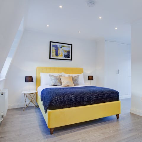 Enjoy a blissful night's sleep in the stylish bedroom