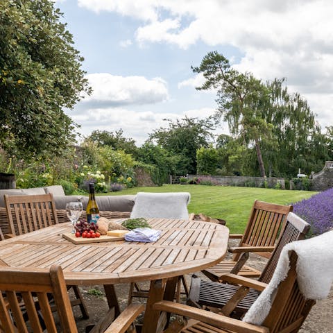 Sit down for cheese and wine at the outdoor dining area