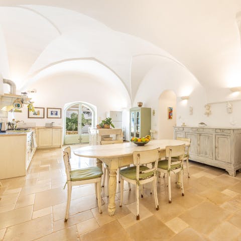 Whip up fresh pasta in the pretty, rustic kitchen