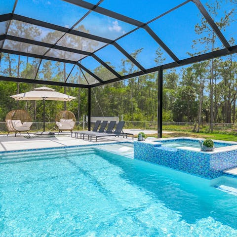 Watch kids make a splash from the Jacuzzi or terrace