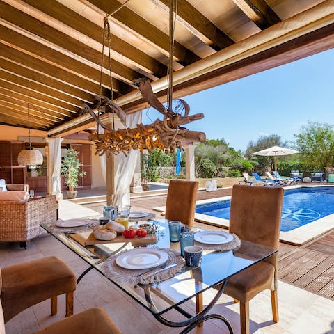 Spend evenings dining under the covered terrace