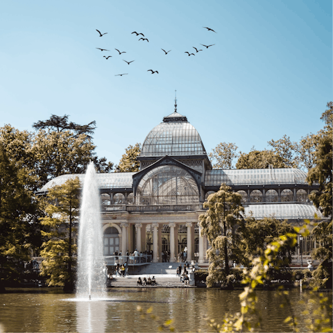 Spend an afternoon strolling through nearby El Retiro Park