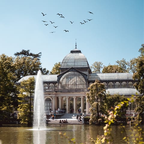 Spend an afternoon strolling through nearby El Retiro Park