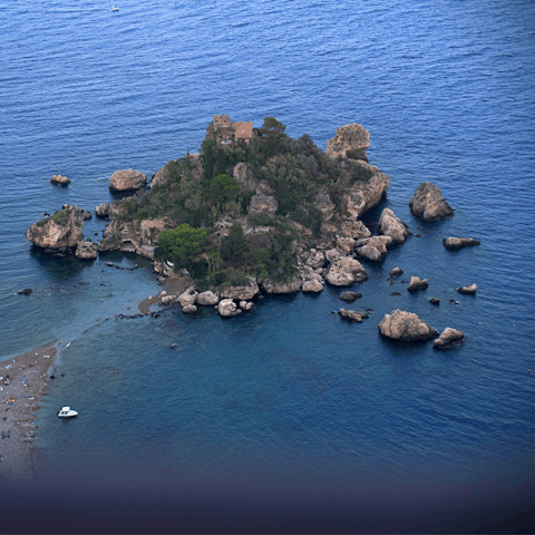 Take the cable car to Isola Bella where turquoise waters await