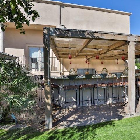 Rustle up a batch of margaritas at the full outdoor bar