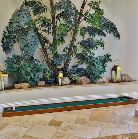 Practise your putting before heading to one of the local golf courses