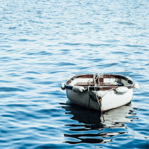 Head out exploring on a rowing boat