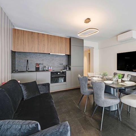 Relax in the open-plan living area with a glass of French wine