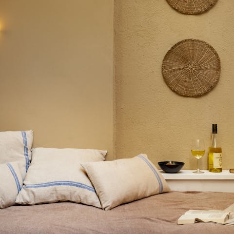Relax on the day bed in the blissful Barcelona sunshine