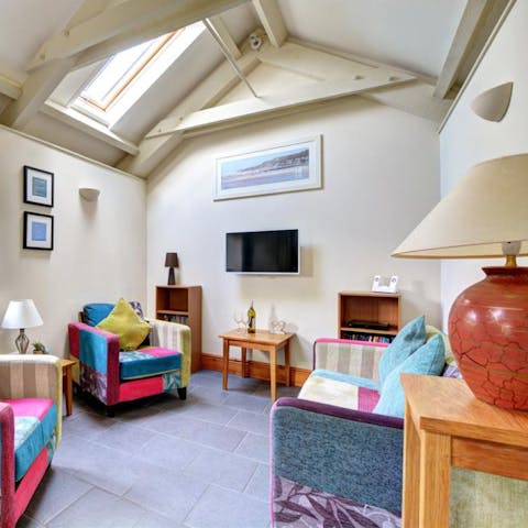 Relax in your bright, colourful living area after a day out hiking or cycling