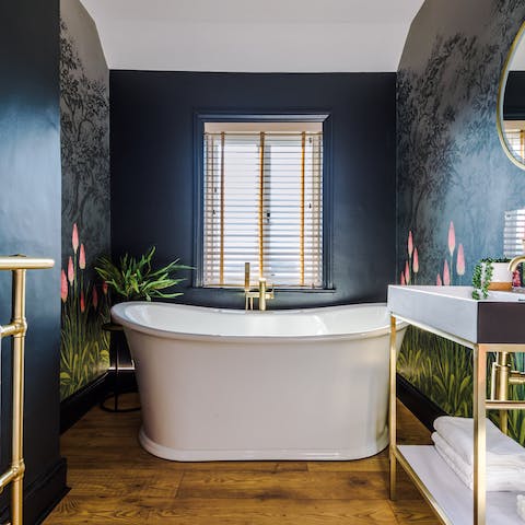 Luxuriate in the lavish bathtub and feel your stress slip away