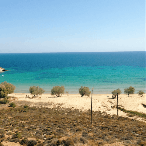 Stroll down to Castello Beach, just a two minute walk from the villa