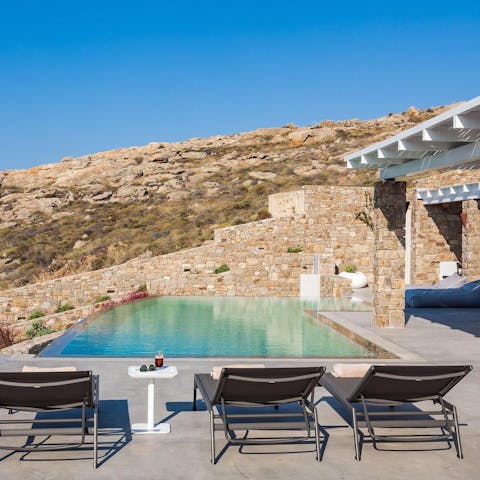 Spend your days topping up your tan by the pool