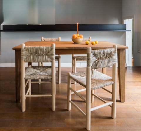Put together a platter of Iberian finger food and dig in at the solid wood dining table