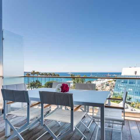 Drink in views of the bay and Palais des Festivals on the terrace