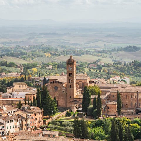 Drive through rolling hills and into the medieval town of Montepulciano – just eleven–minutes from this home