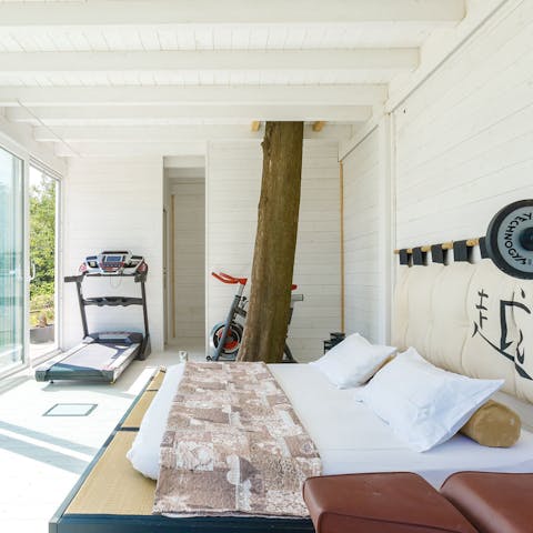 Take advantage of workout equipment in the annexe bedroom
