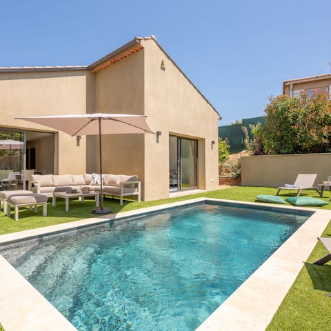 Dive into the private pool or soak up the sun beside it