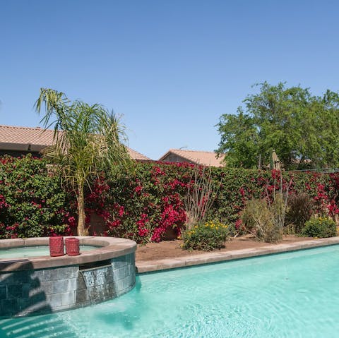 Cool off with a dip in the pool or soak in the spa