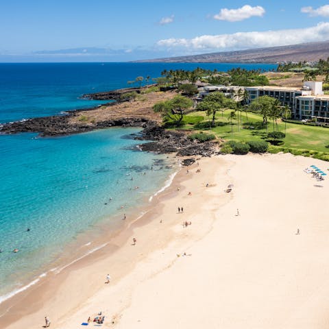 Sprawl out on Hapuna Beach, moments from your door