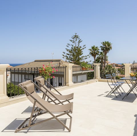 Relax on sunbaked rooftop terraces