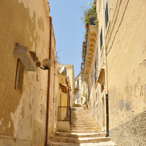 Explore the stunning seaside town of Avola where you can stock up on groceries in its shops and supermarkets
