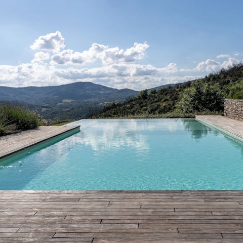 Enjoy the magic of doing nothing while lounging by the pool