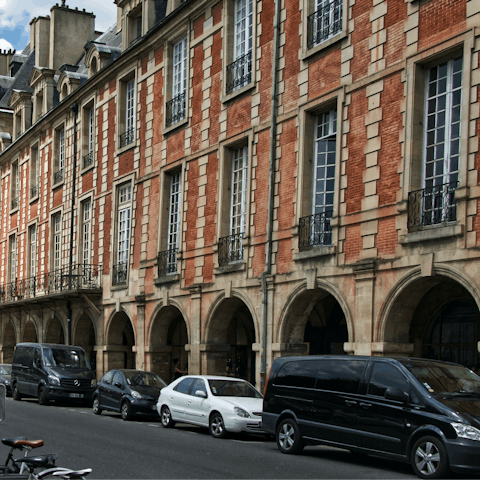 Explore the Place des Vosges, a walk or short ride away