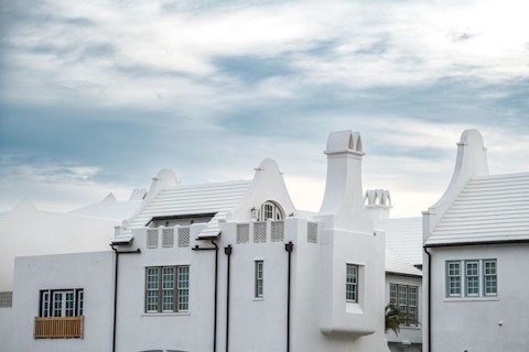 Wander Alys Beach's stunning whitewashed Bahamian-style architecture and serene courtyards