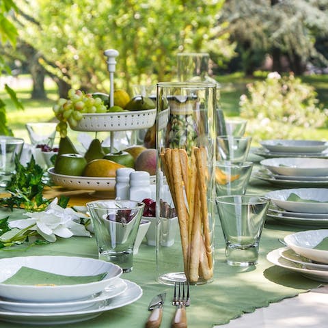 Savour alfresco dining under the maple trees