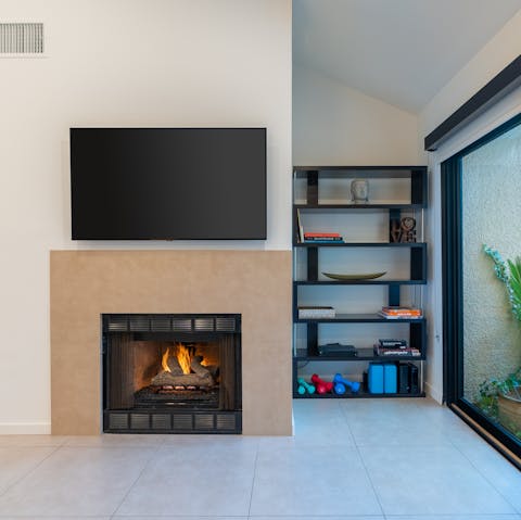Turn on the fireplace and get toasty during cooler evenings