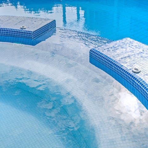 Unwind in the private Jacuzzi and swimming pool