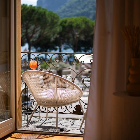 Watch the world go by from the private balcony