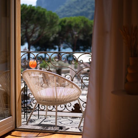 Watch the world go by from the private balcony
