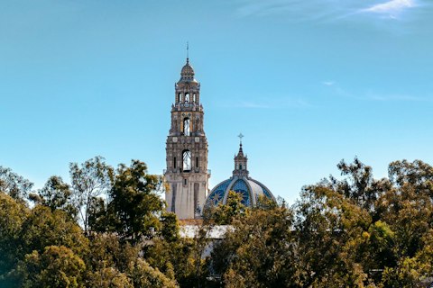 Explore Balboa Park's world-class museums and gardens, a fourteen-minute drive