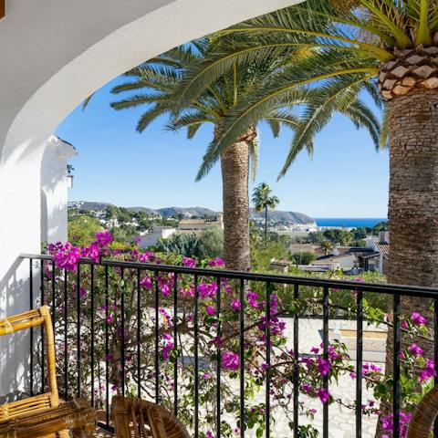 Enjoy views of the ocean and mountains from your pretty and private balcony