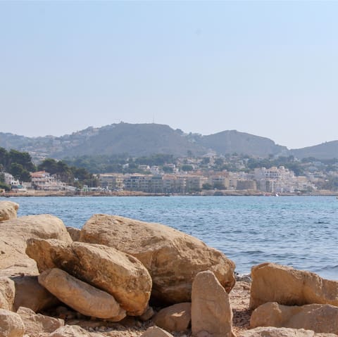 Check out the stunning beach of Moraira, where you can try watersports or take a boat tour