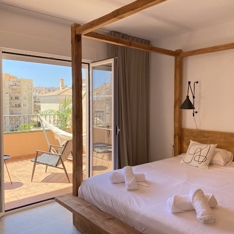 Roll out of bed and onto your own private balcony and relax on a deck chair