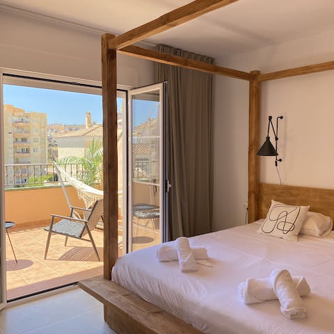 Roll out of bed and onto your own private balcony and relax on a deck chair