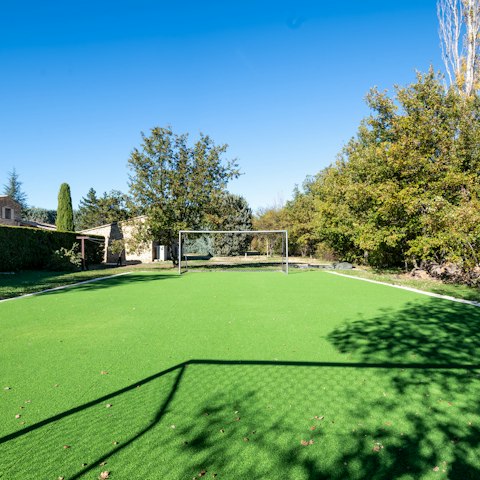 Play a game of soccer with the kids