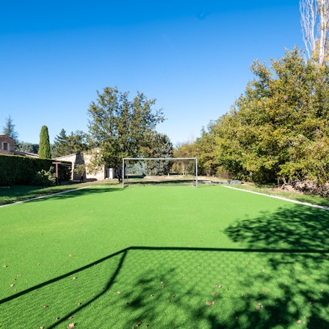 Play a game of soccer with the kids