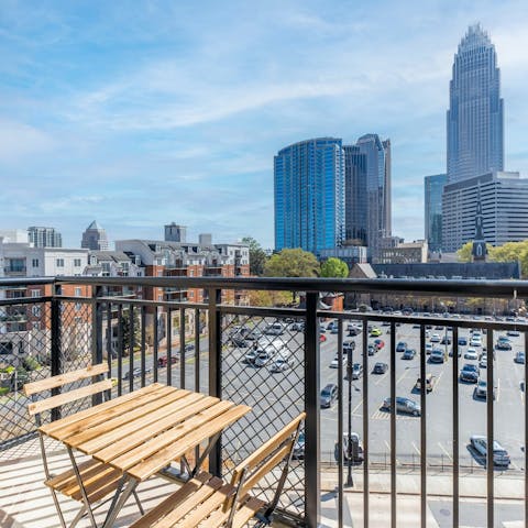 Enjoy morning coffee alongside city views on the balcony