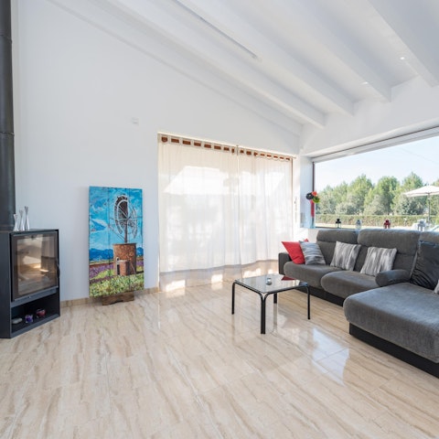 Cosy up by the log burner when the Mallorcan weather turns chilly