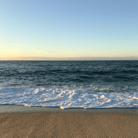 Sink your feet into the sand at Plage Mace beach