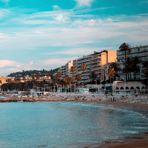 Feel the sun warm your skin as you stroll along La Croisette
