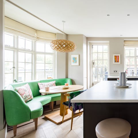 Enjoy a hearty breakfast in the chic booth by the bay window